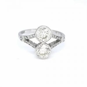 1.60ct Two Stone Diamond Ring; two brilliant diamonds, collet set with openwork under-gallery, diamond set split shoulders, 18ct white gold