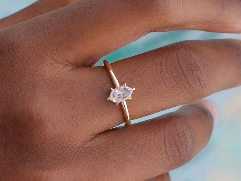 Moissanite solitaire diamond ring with prongs on gold band