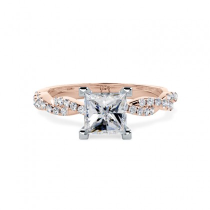 A beautiful princess cut diamond ring with shoulder stones in 18ct rose & white gold