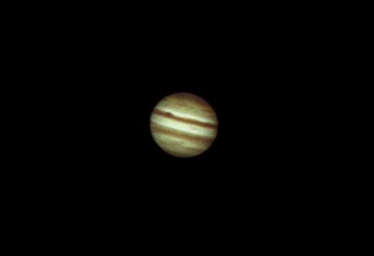 The Planet Jupiter captured through the telescope eyepiece