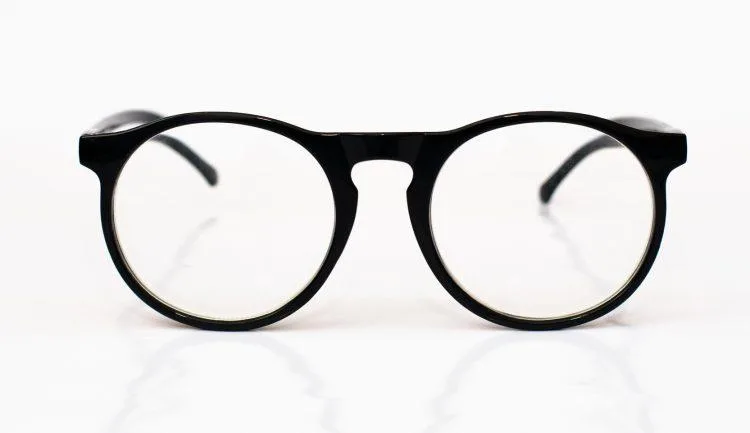 Black-bordered glasses isolated on white background.