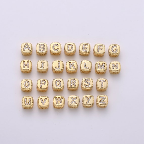 Alphabet beads gold